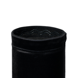 Close up of the top of a black LEGION Arm Sleeve with a wavy silicone gripper band inside