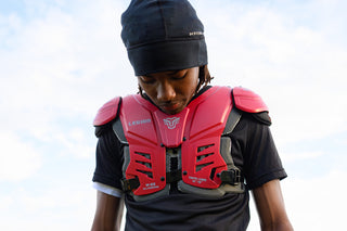 Youth wearing LEGION M-80 Youth University Football Shoulder Pads