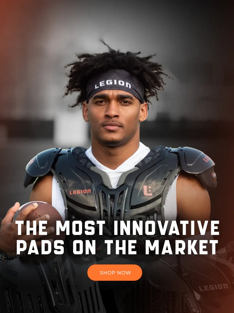 Football player in Legion shoulder pads and headband holding a football