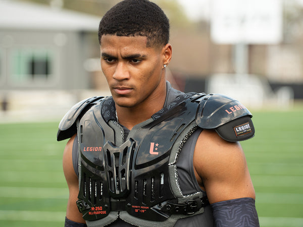 Football player wearing Legion M-250 All-Purpose shoulder pads
